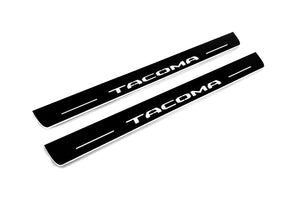 Illuminated LED Door Sill Tread Plates Toyota Tacoma III 2016+ With Tacoma Logo Toyota Led Door Sills opdesign