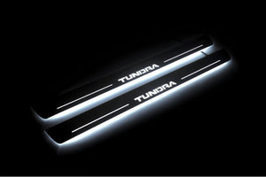 Illuminated LED Door Sill Tread Plates Toyota Tundra III 2014-2021 With Tundra Logo Toyota Led Door Sills opdesign