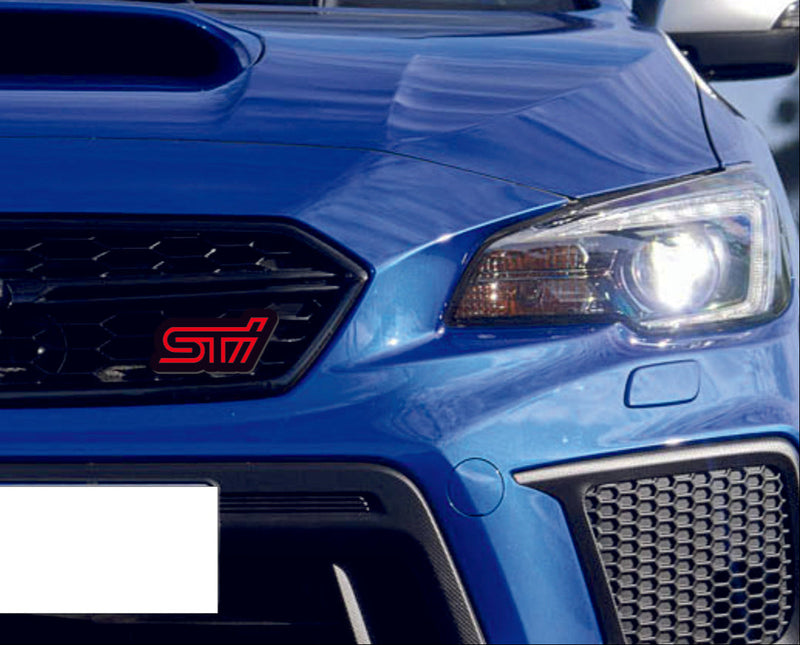 Subaru STI LED grille badge on a Subaru grille