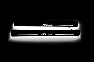 Illuminated LED Door Sill Tread Plates Ford Focus III 2011-2018 With Focus Logo Ford Led Door Sills opdesign