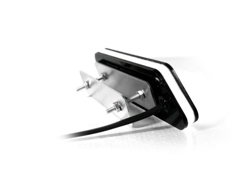 Grille mounting: two bolts and a backing plate. Mounting example shown.