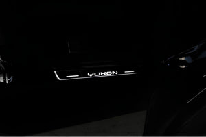 Illuminated LED Door Sill Tread Plates GMC Yukon V 2020+ With Yukon Logo GMC Led Door Sills opdesign