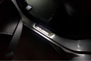 Illuminated LED Door Sill Tread Plates Mitsubishi Outlander II 2007-2012 With Outlander Logo Mitsubishi Led Door Sills opdesign