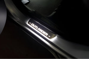 Illuminated LED Door Sill Tread Plates Mitsubishi Outlander II 2007-2012 With Outlander Logo Mitsubishi Led Door Sills opdesign