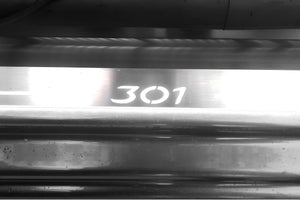 Illuminated LED Door Sill Tread Plates Peugeot 301 2012+ With 301 Logo Peugeot Led Door Sills opdesign