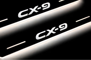 Illuminated LED Door Sill Tread Plates Mazda II 2016+ With CX-9 Logo Mazda Led Door Sills opdesign
