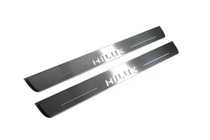 Illuminated LED Door Sill Tread Plates Toyota Hilux VIII 2015+ With Hilux Logo Toyota Led Door Sills opdesign