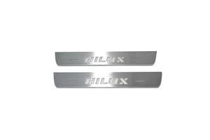 Illuminated LED Door Sill Tread Plates Toyota Hilux VIII 2015+ With Hilux Logo Toyota Led Door Sills opdesign