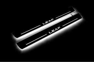 Illuminated LED Door Sill Tread Plates Nissan Leaf II 2017+ With Leaf Logo Nissan Led Door Sills opdesign