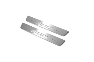 Illuminated LED Door Sill Tread Plates Toyota Hilux VIII 2015+ With Hilux Logo Toyota Led Door Sills opdesign