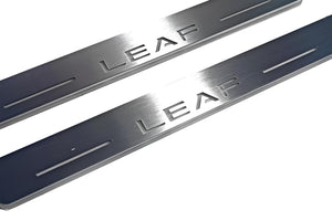 Illuminated LED Door Sill Tread Plates Nissan Leaf II 2017+ With Leaf Logo Nissan Led Door Sills opdesign
