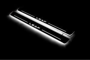 Illuminated LED Door Sill Tread Plates Nissan Leaf II 2017+ With Leaf Logo Nissan Led Door Sills opdesign