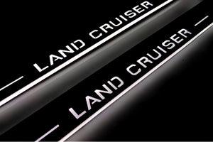Illuminated LED Door Sill Tread Plates Toyota LC 200 2007-2021 With Land Cruiser Logo (type 1) Toyota Led Door Sills opdesign
