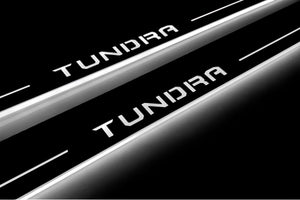 Illuminated LED Door Sill Tread Plates Toyota Tundra IV 2022+ With Tundra Logo (CrewMax) Toyota Led Door Sills opdesign