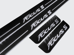 Illuminated LED Door Sill Tread Plates Ford Focus III 2011-2018 With Focus S Logo Ford Led Door Sills opdesign WHITE FRONT STAINLESS STEEL