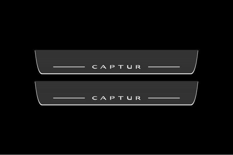 Catalog illustration of two long gray door sill plates with white Captur lettering and horizontal lines on a black background.