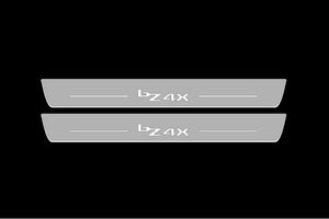 Illuminated LED Door Sill Tread Plates Toyota bZ4X 2022+ With bZ4X Logo Toyota Led Door Sills opdesign
