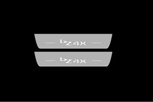 Illuminated LED Door Sill Tread Plates Toyota bZ4X 2022+ With bZ4X Logo Toyota Led Door Sills opdesign