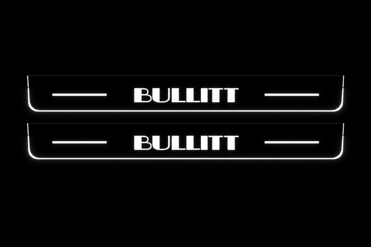 Product visualization: Exact original BULLITT lettering, two flat source plates; nearly invisible black metal flat brushed stainless steel door sill plates with white LED artwork and edges, dark background.