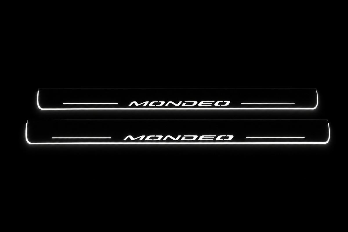 Product visualization: two exact mondeo-v flat Stainless front sill plates with original artwork, neutral white LEDs and own thin-edge geometry flat brushed stainless steel door sill plates with white LED artwork and edges, dark background.