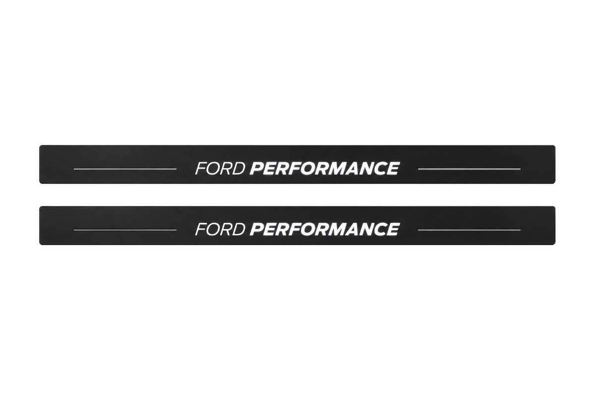 Catalogue illustration of two black Matte PRO front sill plates with the two-part italic FORD PERFORMANCE inscription illuminated on top. One decorative bar on either side and the edges remain unlit; no rear plates or exact dimensions pictured.