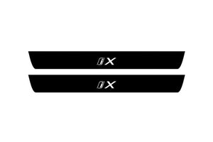 BMW iX 2021+ Illuminated Matte Sill Plates with logo iX BMW Led Door Sills PRO opdesign