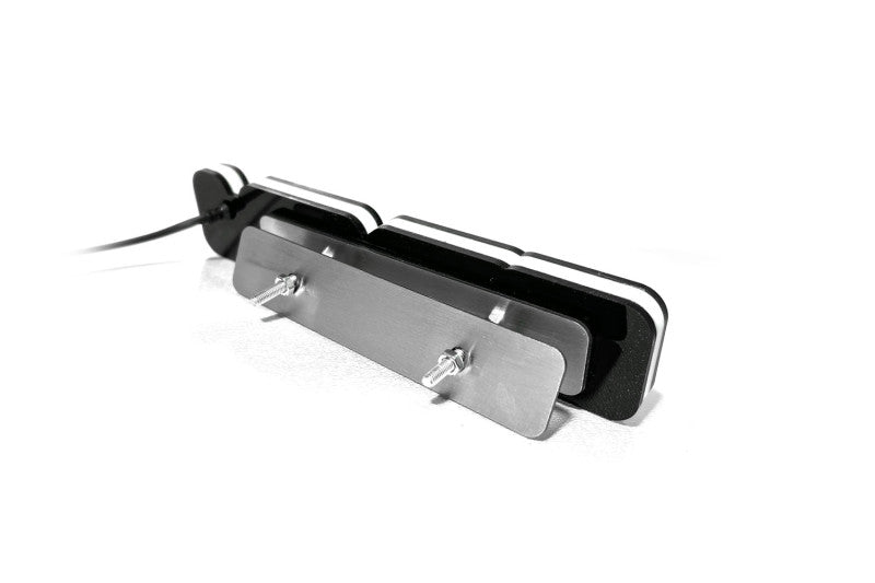Grille mounting: two bolts and a backing plate. Mounting example shown.