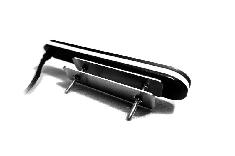 Grille mounting: two bolts and a backing plate. Mounting example shown.
