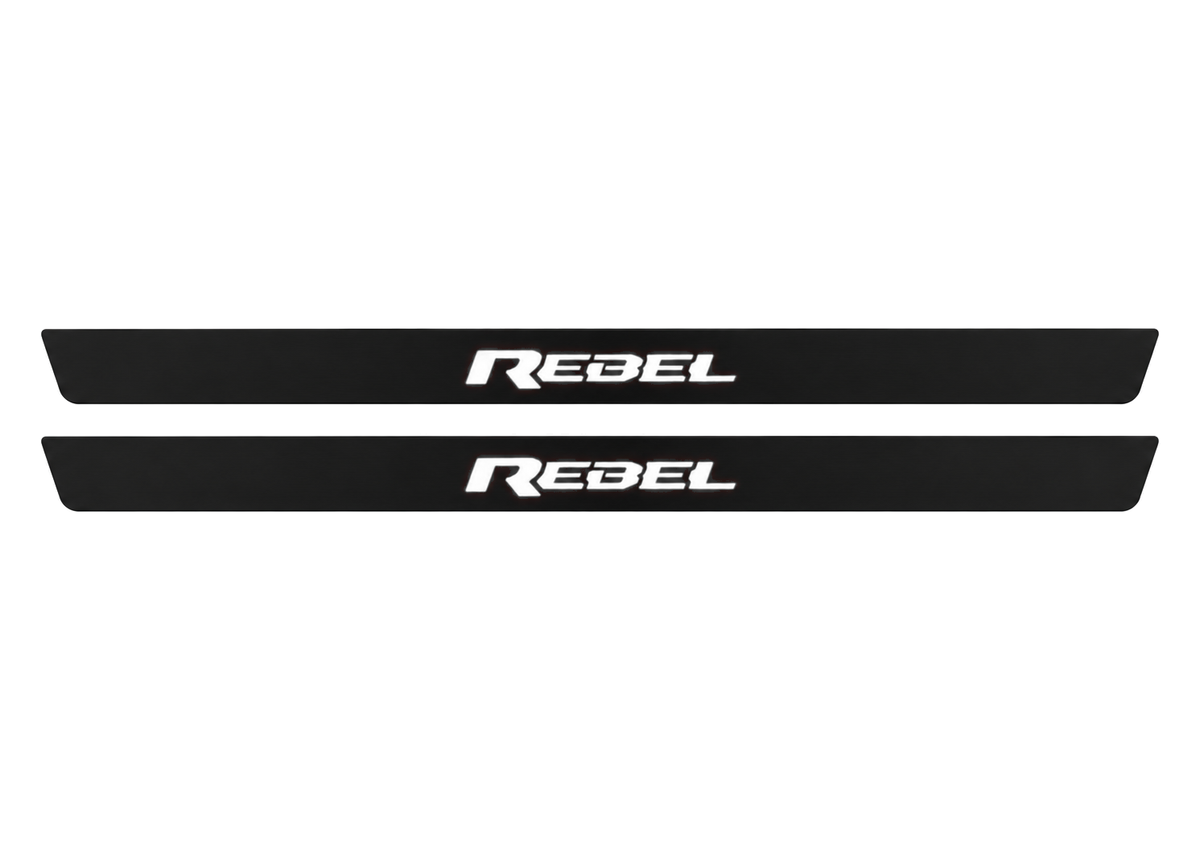 Matte PRO catalogue illustration showing two FRONT plates with illuminated REBEL lettering on a white background; RAM 2500 V dimensions are selected during manufacture; rear plates are not pictured.