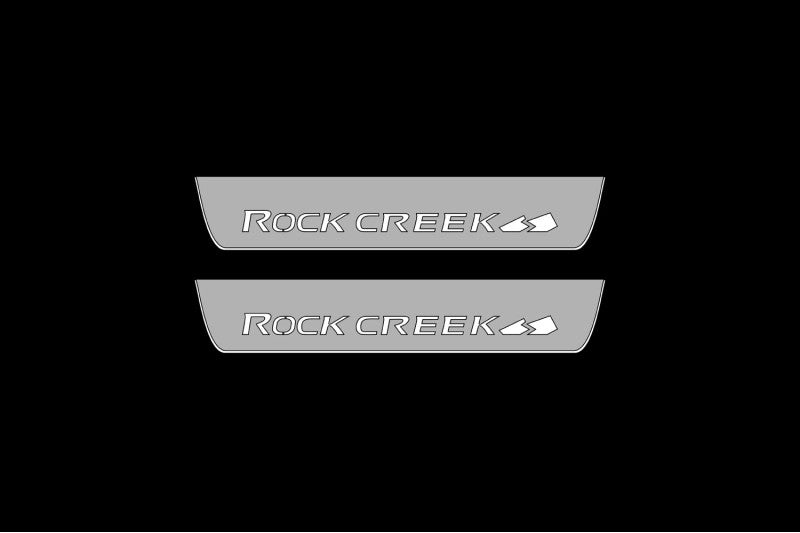 Illuminated LED Door Sills – Tread Plates Nissan Rogue III 2021+ With Rock Creek Logo LED Illuminated Nissan Led Door Sills opdesign