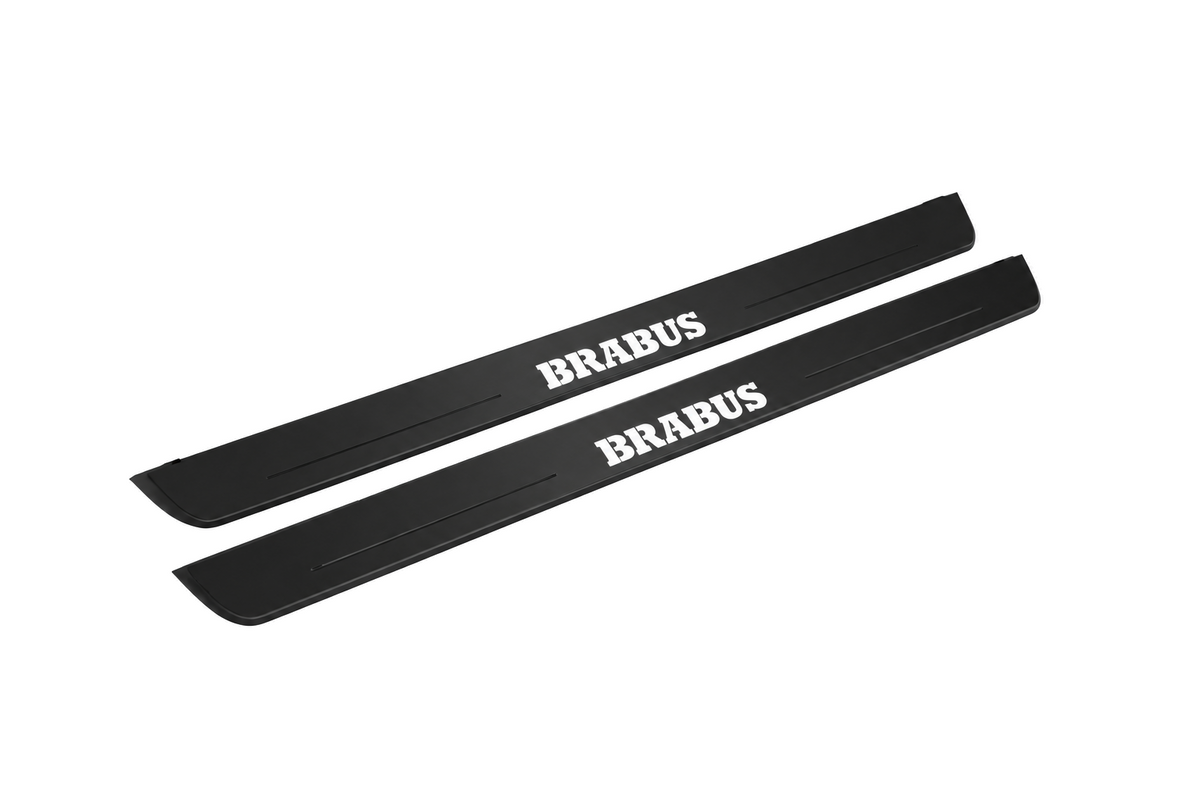 Matte PRO catalogue illustration showing two FRONT plates with illuminated Brabus lettering on a white background; smart fortwo C453 dimensions are selected during manufacture; rear plates are not pictured.