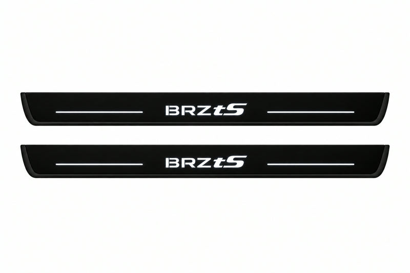 Catalog illustration of two front black Matte PRO LED door sill plates with illuminated BRZ tS lettering for Subaru BRZ Coupe ZD8.