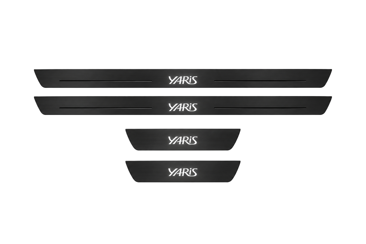 Catalogue illustration of two long black Matte PRO front plates with illuminated YARIS lettering and top lines, plus two short rear plates with YARIS lettering only; side edges unlit. Dimensions selected for Yaris XP130 during manufacture.