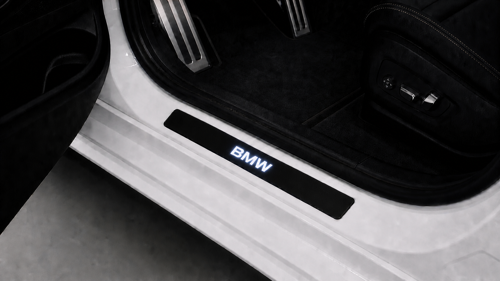 BMW OEM lettering demonstration on a door sill