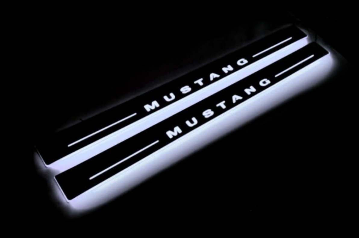 Ford LED door sill installed on outer painted metal threshold
