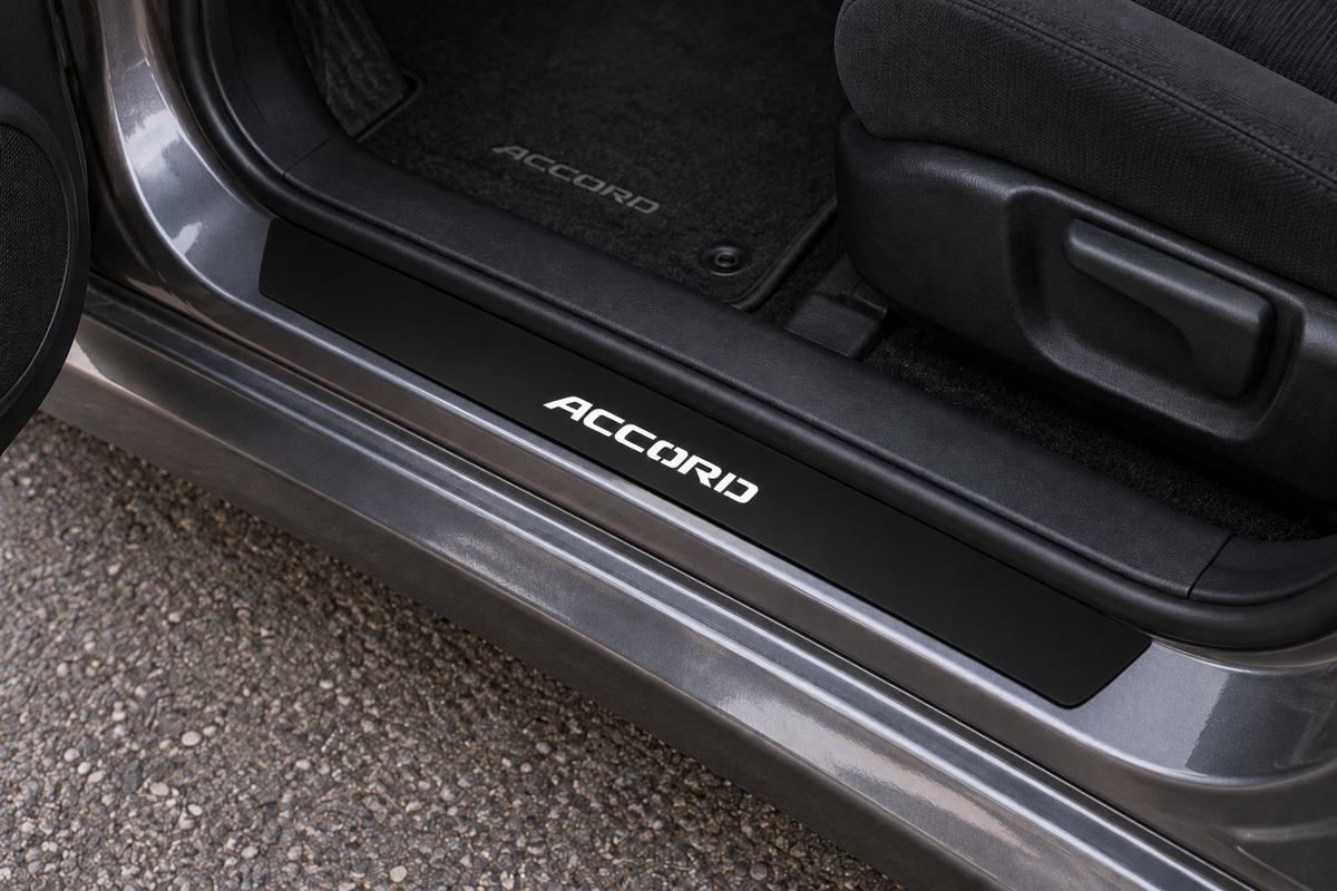 Honda Accord VII Matte PRO sill visualization directly against the rubber seal on an exposed graphite metal threshold, with white ACCORD lettering and dark edges.