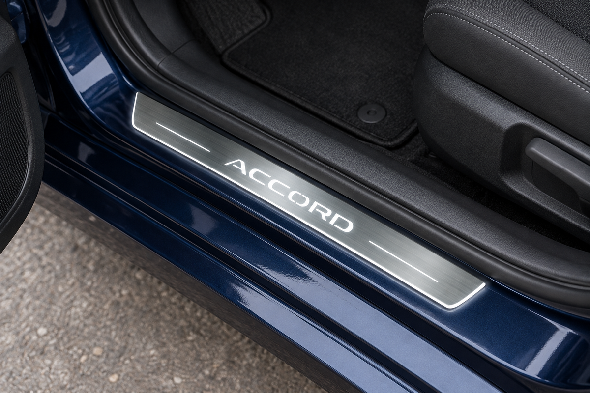 Product visualization of a brushed stainless ACCORD sill with white lettering, narrow light bars and edge lighting in a navy-blue Honda doorway.