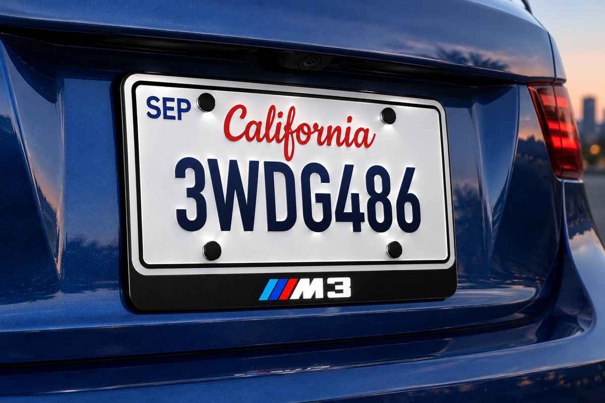 Product visualization of the M3 LED badge below an illustrative US plate in a blue sedan recess, retaining three coloured stripes and white M3 artwork. Plate not included.