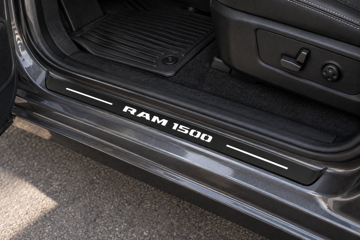 Product visualization of a black RAM 1500 Matte PRO sill in a pickup doorway, with white RAM 1500 lettering and two top light lines; the side edges remain unlit.
