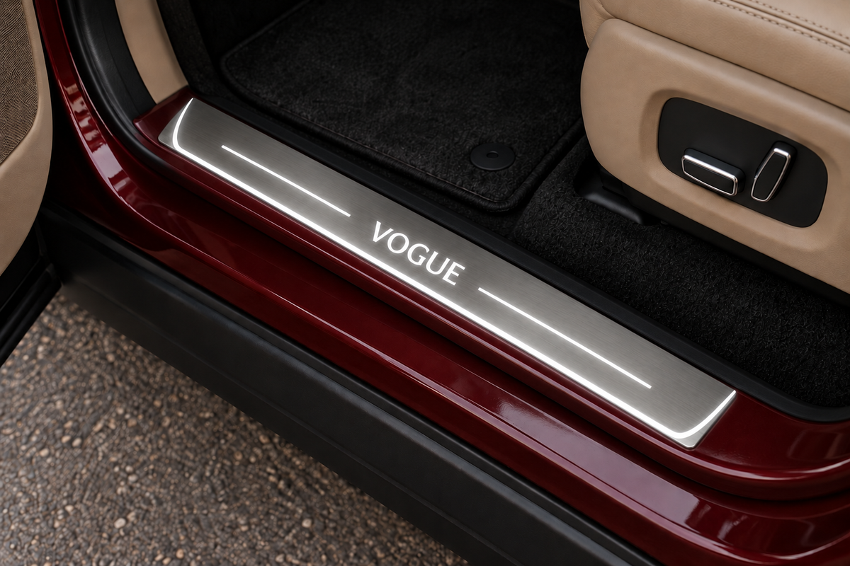 VOGUE Stainless Steel sill on an exposed Range Rover threshold directly against the rubber seal — product visualization