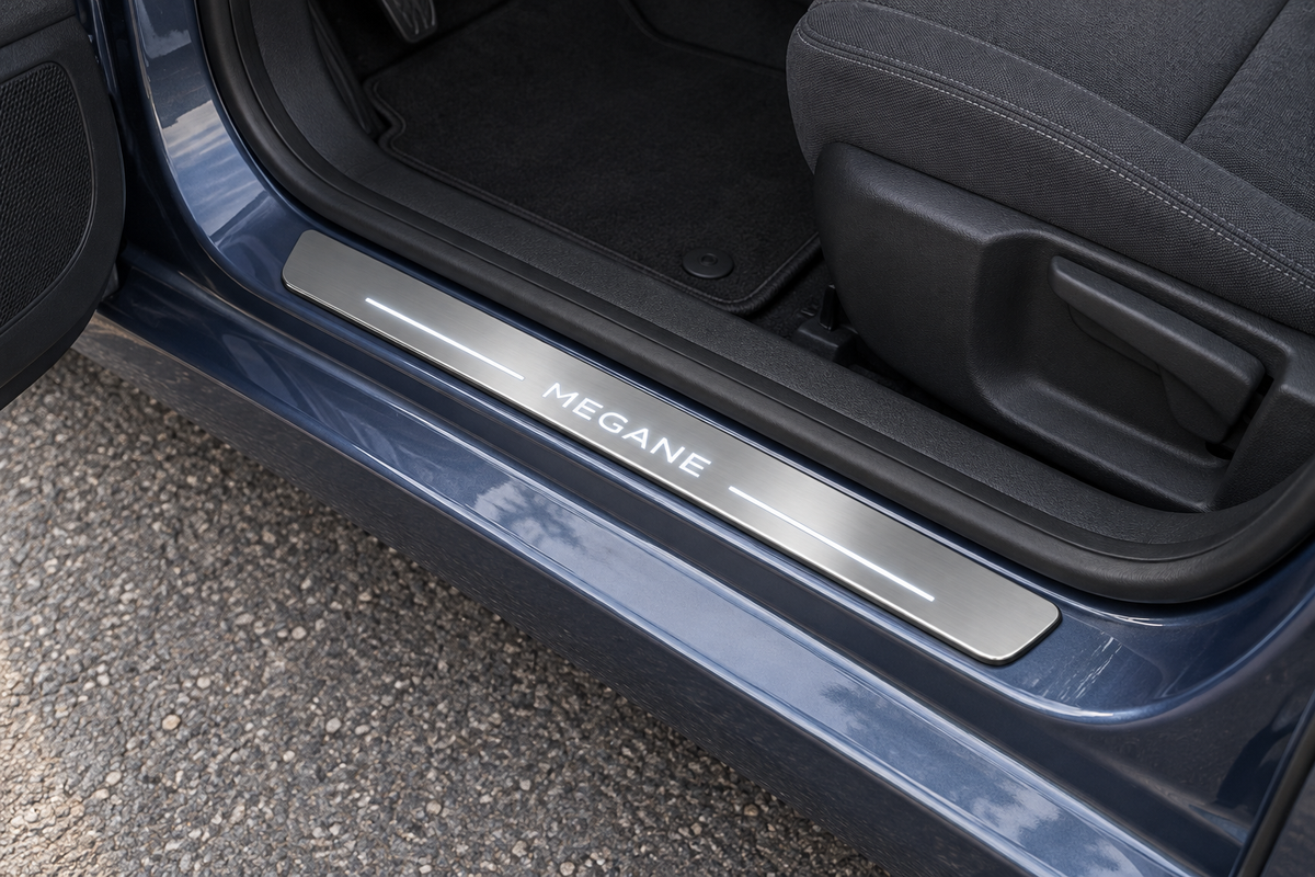 Renault Megane III Stainless Steel product visualization with MEGANE lettering, two white top light bars and a thin physical edge light in a slate-blue hatchback doorway.