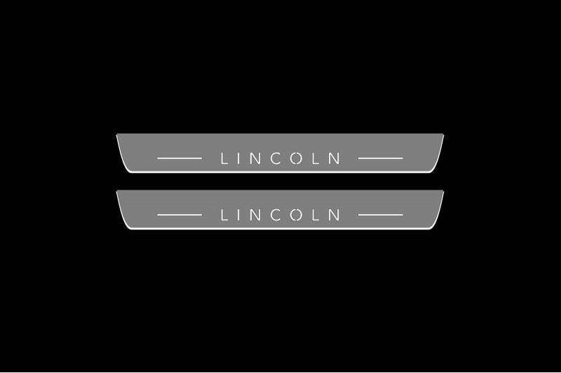 Lincoln LED door sill installed on outer painted metal threshold