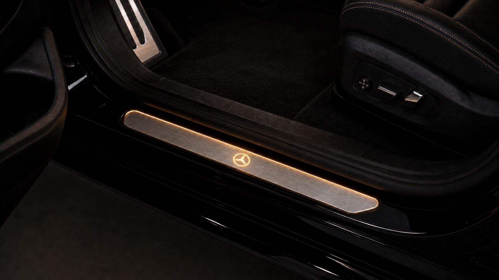 Mercedes-Benz illuminated door sill introducing the editorial theme of Factory Sameness and Personal Identity: Why Owners Change Good Cars