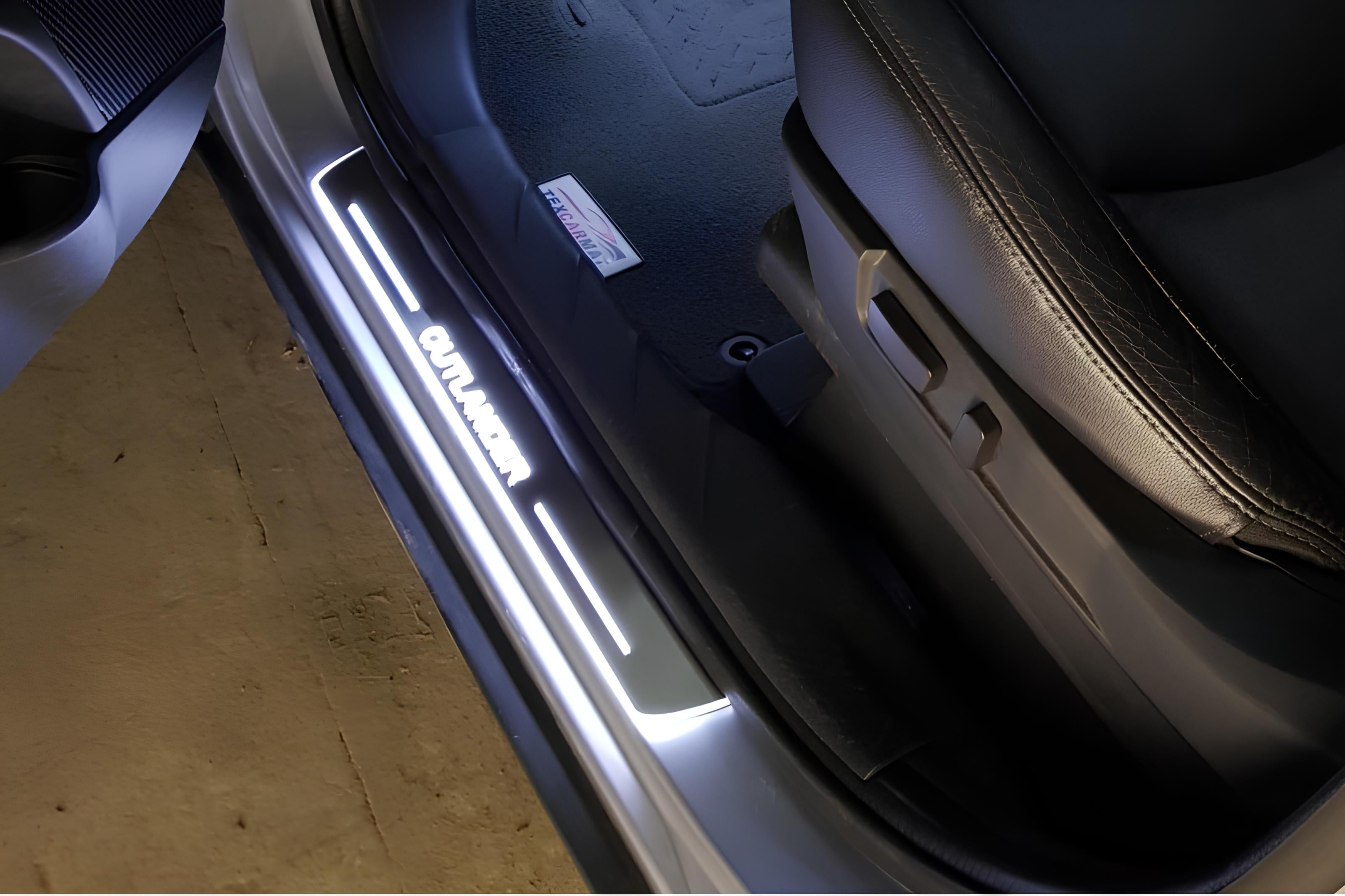Illuminated LED Door Sill Tread Plates Mitsubishi Outlander II 2007-2012 With Outlander Logo Mitsubishi Led Door Sills opdesign