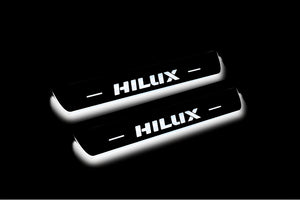 Illuminated LED Door Sill Tread Plates Toyota Hilux VIII 2015+ With Hilux Logo Toyota Led Door Sills opdesign