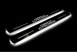 Toyota Corolla Cross Stainless LED Door Sills – Corolla Cross Logo