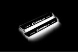 LED door sill plates Toyota Corolla XI 2013+ stainless steel with Corolla logo