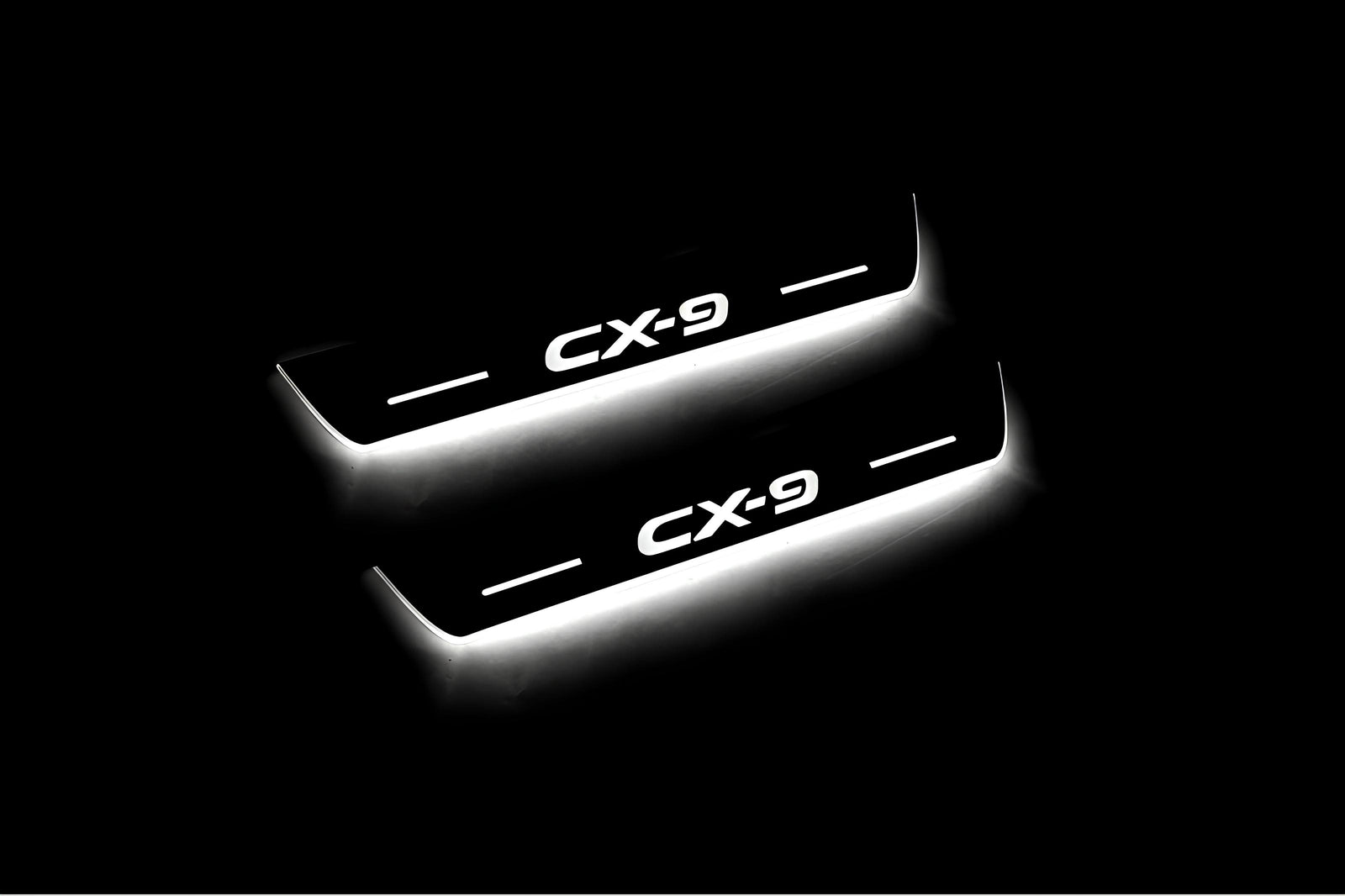 Mazda II 2016+ illuminated entry guards in stainless steel with CX-9 logo