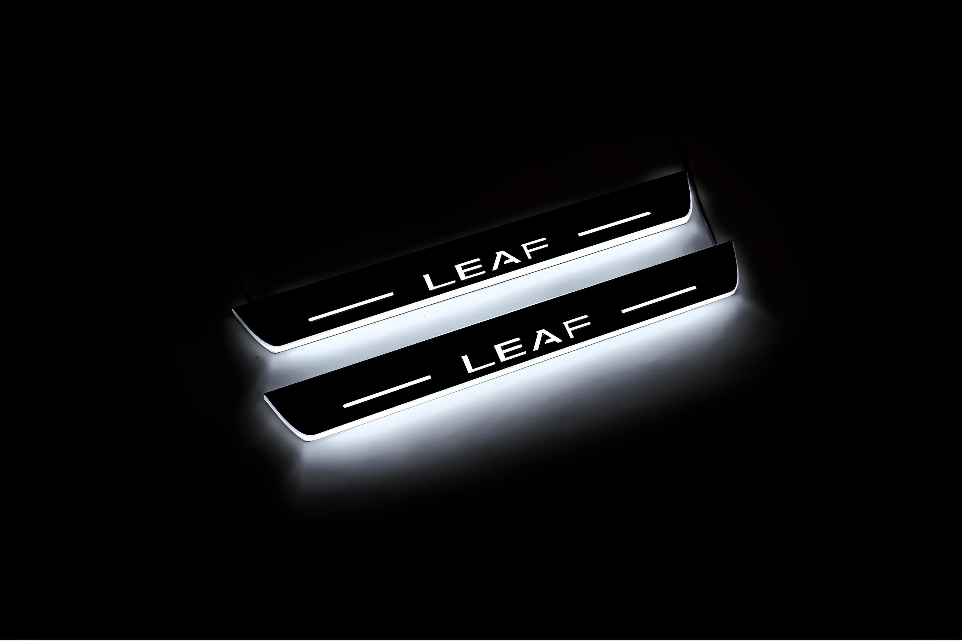 Illuminated LED Door Sill Tread Plates Nissan Leaf II 2017+ With Leaf Logo Nissan Led Door Sills opdesign