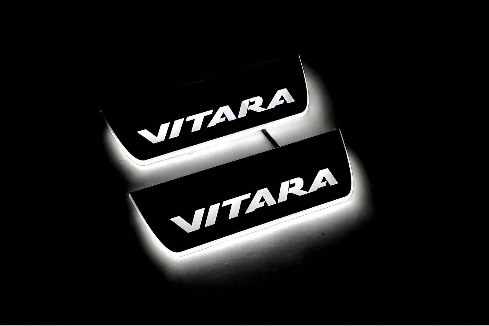 Suzuki Vitara 2015+ illuminated entry guards in stainless steel with Vitara logo